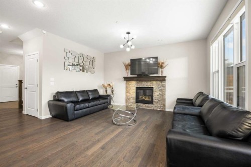 134 Howse Rise Ne, Calgary, AB - Indoor Photo Showing Living Room With Fireplace