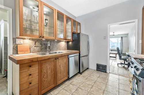 430 15 Avenue Ne, Calgary, AB - Indoor Photo Showing Kitchen With Stainless Steel Kitchen With Double Sink