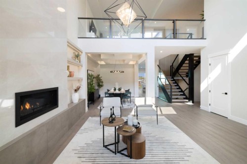 17 Sunvalley View, Cochrane, AB - Indoor Photo Showing Living Room With Fireplace