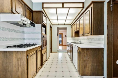 79 Chancellor Way Nw, Calgary, AB - Indoor Photo Showing Kitchen