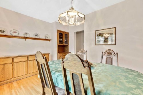 79 Chancellor Way Nw, Calgary, AB - Indoor Photo Showing Dining Room