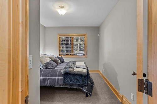 3-124 Silvertip Ridge, Canmore, AB - Indoor Photo Showing Bedroom