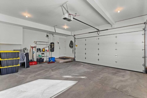 3-124 Silvertip Ridge, Canmore, AB - Indoor Photo Showing Garage