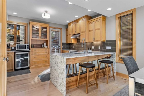 3-124 Silvertip Ridge, Canmore, AB - Indoor Photo Showing Kitchen With Double Sink