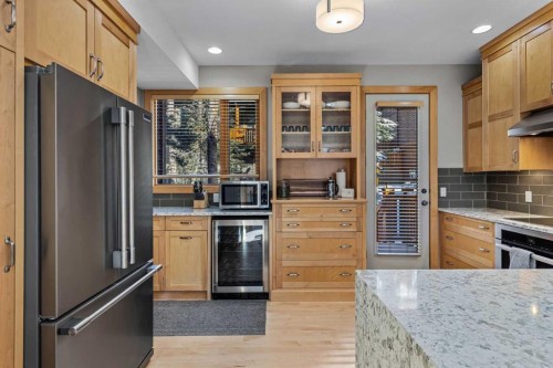 3-124 Silvertip Ridge, Canmore, AB - Indoor Photo Showing Kitchen With Stainless Steel Kitchen