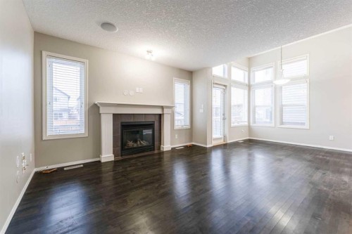 20 Bridlecrest Court Sw, Calgary, AB - Indoor Photo Showing Living Room With Fireplace