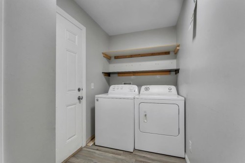 11 Saddlebrook Way Ne, Calgary, AB - Indoor Photo Showing Laundry Room