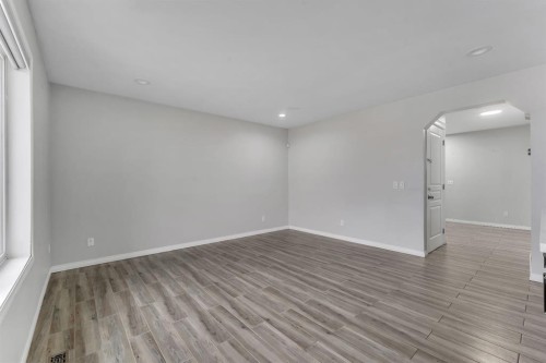 11 Saddlebrook Way Ne, Calgary, AB - Indoor Photo Showing Other Room