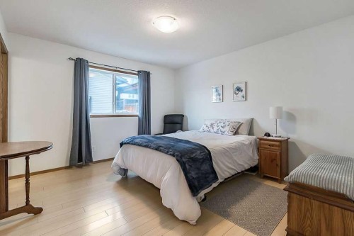 518 Sunrise Way Sw, Diamond Valley, AB - Indoor Photo Showing Bedroom