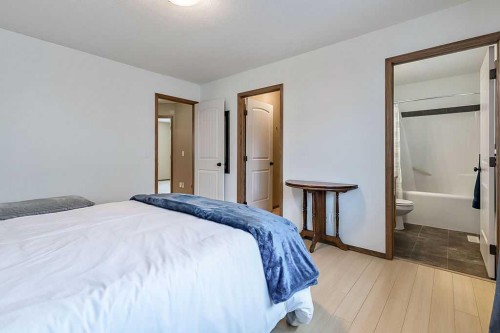 518 Sunrise Way Sw, Diamond Valley, AB - Indoor Photo Showing Bedroom