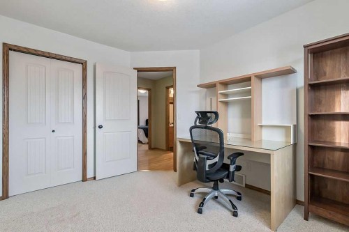 518 Sunrise Way Sw, Diamond Valley, AB - Indoor Photo Showing Other Room