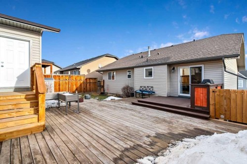 518 Sunrise Way Sw, Diamond Valley, AB - Outdoor With Deck Patio Veranda With Exterior