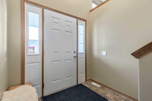 518 Sunrise Way Sw, Diamond Valley, AB - Indoor Photo Showing Other Room