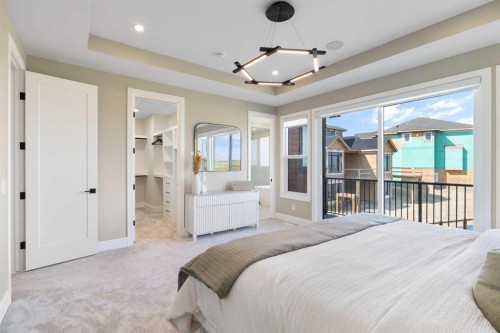 48 Sunvalley View, Cochrane, AB - Indoor Photo Showing Bedroom