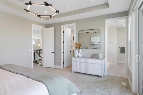 48 Sunvalley View, Cochrane, AB - Indoor Photo Showing Bedroom