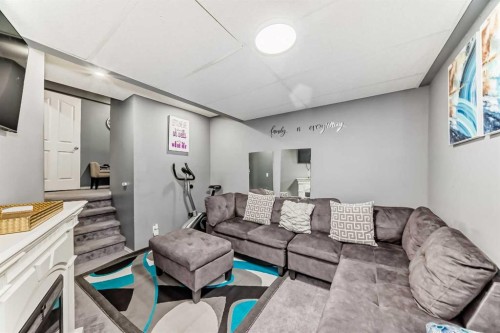 12 Taravista Crescent Ne, Calgary, AB - Indoor Photo Showing Living Room