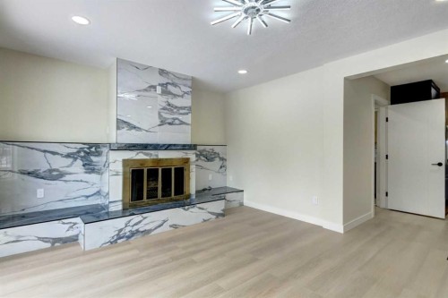 2443 42 Street Se, Calgary, AB - Indoor With Fireplace