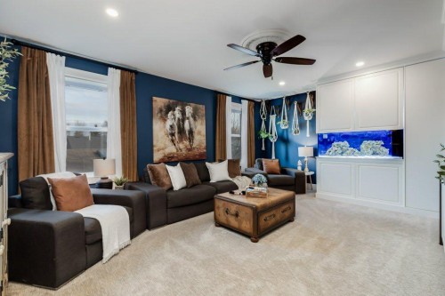 1220 Meadowbrook Drive Se, Airdrie, AB - Indoor Photo Showing Living Room