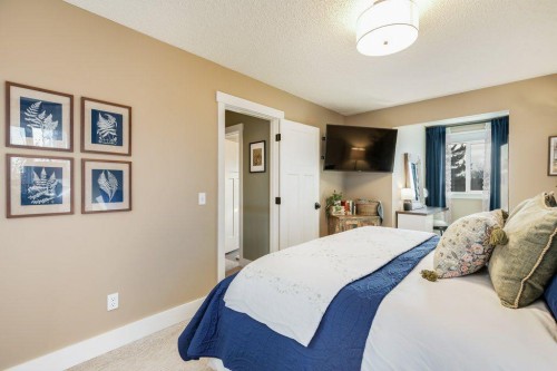 1220 Meadowbrook Drive Se, Airdrie, AB - Indoor Photo Showing Bedroom
