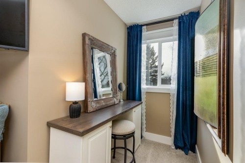 1220 Meadowbrook Drive Se, Airdrie, AB - Indoor Photo Showing Other Room