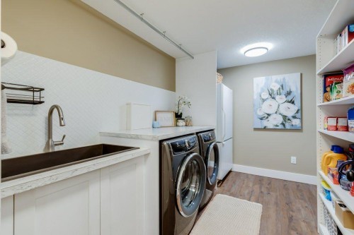 1220 Meadowbrook Drive Se, Airdrie, AB - Indoor Photo Showing Laundry Room