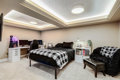 1220 Meadowbrook Drive Se, Airdrie, AB - Indoor Photo Showing Bedroom