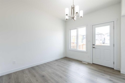 438 Heartland Way, Cochrane, AB - Indoor Photo Showing Other Room