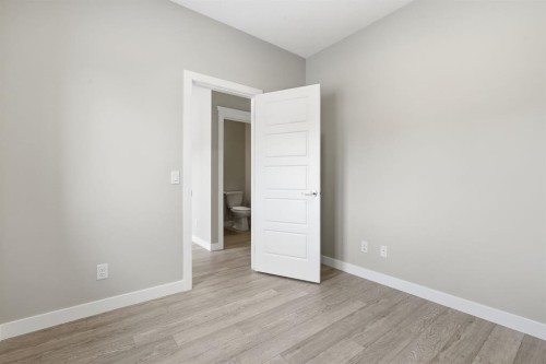 936 Reynolds Lane Sw, Airdrie, AB - Indoor Photo Showing Other Room