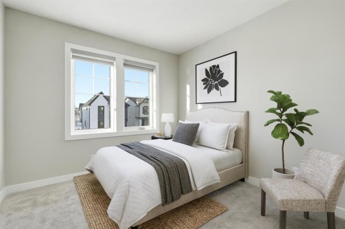 936 Reynolds Lane Sw, Airdrie, AB - Indoor Photo Showing Bedroom