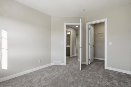 936 Reynolds Lane Sw, Airdrie, AB - Indoor Photo Showing Other Room