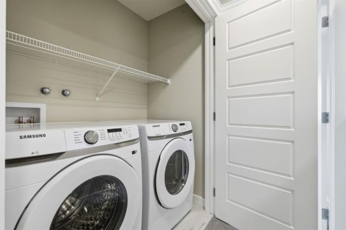 936 Reynolds Lane Sw, Airdrie, AB - Indoor Photo Showing Laundry Room