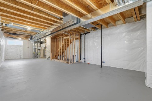 936 Reynolds Lane Sw, Airdrie, AB - Indoor Photo Showing Basement