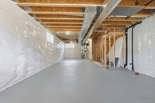 936 Reynolds Lane Sw, Airdrie, AB - Indoor Photo Showing Basement