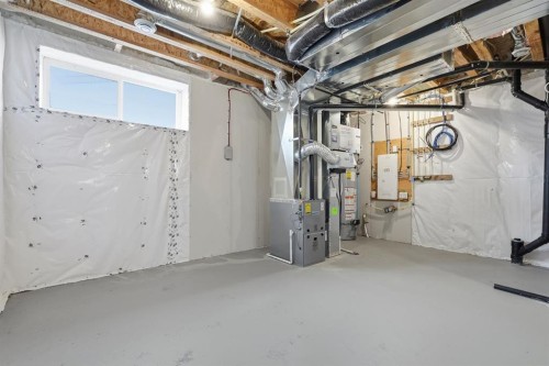 936 Reynolds Lane Sw, Airdrie, AB - Indoor Photo Showing Basement