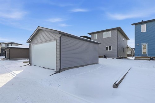 936 Reynolds Lane Sw, Airdrie, AB - Outdoor With Exterior