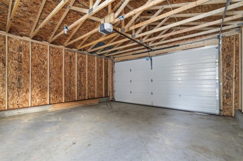 936 Reynolds Lane Sw, Airdrie, AB - Indoor Photo Showing Garage