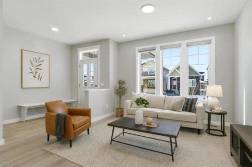 936 Reynolds Lane Sw, Airdrie, AB - Indoor Photo Showing Living Room