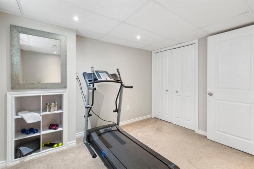 99 Sage Valley Park Nw, Calgary, AB - Indoor Photo Showing Gym Room
