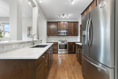 99 Sage Valley Park Nw, Calgary, AB - Indoor Photo Showing Kitchen With Upgraded Kitchen