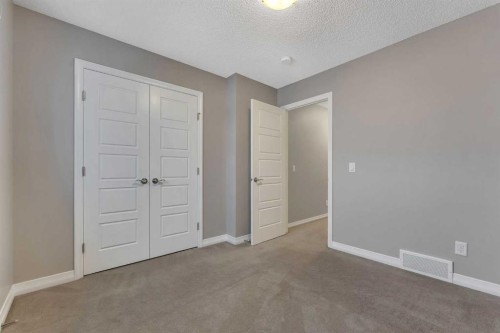96 Cornerstone Passage Ne, Calgary, AB - Indoor Photo Showing Other Room
