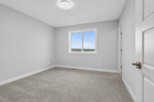 41 Southborough Lane, Cochrane, AB - Indoor Photo Showing Other Room