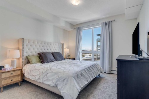 1311-740 Legacy Village Road Se, Calgary, AB - Indoor Photo Showing Living Room