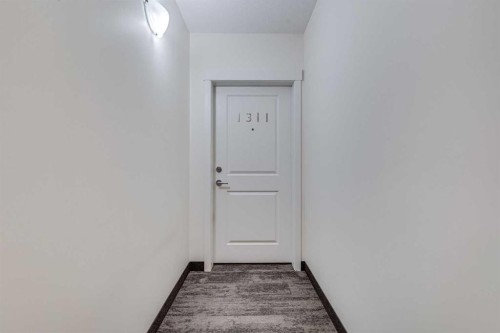 1311-740 Legacy Village Road Se, Calgary, AB - Indoor Photo Showing Laundry Room