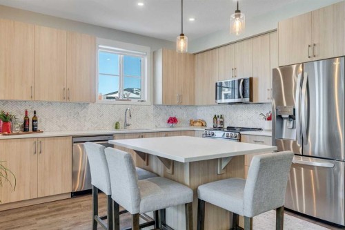 1311-740 Legacy Village Road Se, Calgary, AB - Indoor Photo Showing Kitchen With Stainless Steel Kitchen With Upgraded Kitchen