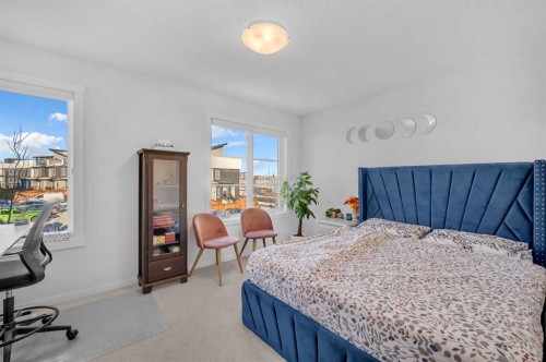 304-474 Seton Circle Se, Calgary, AB - Indoor Photo Showing Bedroom