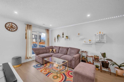 304-474 Seton Circle Se, Calgary, AB - Indoor Photo Showing Living Room