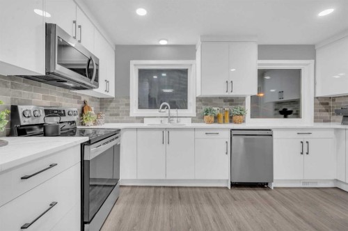 5868 Dalcastle Drive Nw, Calgary, AB - Indoor Photo Showing Kitchen With Upgraded Kitchen