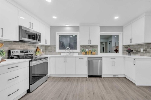 5868 Dalcastle Drive Nw, Calgary, AB - Indoor Photo Showing Kitchen With Upgraded Kitchen