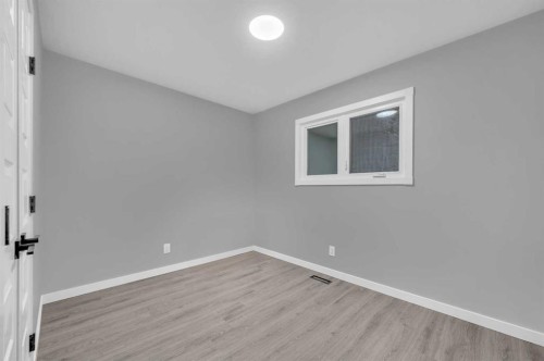 5868 Dalcastle Drive Nw, Calgary, AB - Indoor Photo Showing Other Room