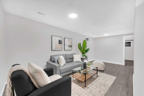 5868 Dalcastle Drive Nw, Calgary, AB - Indoor Photo Showing Living Room